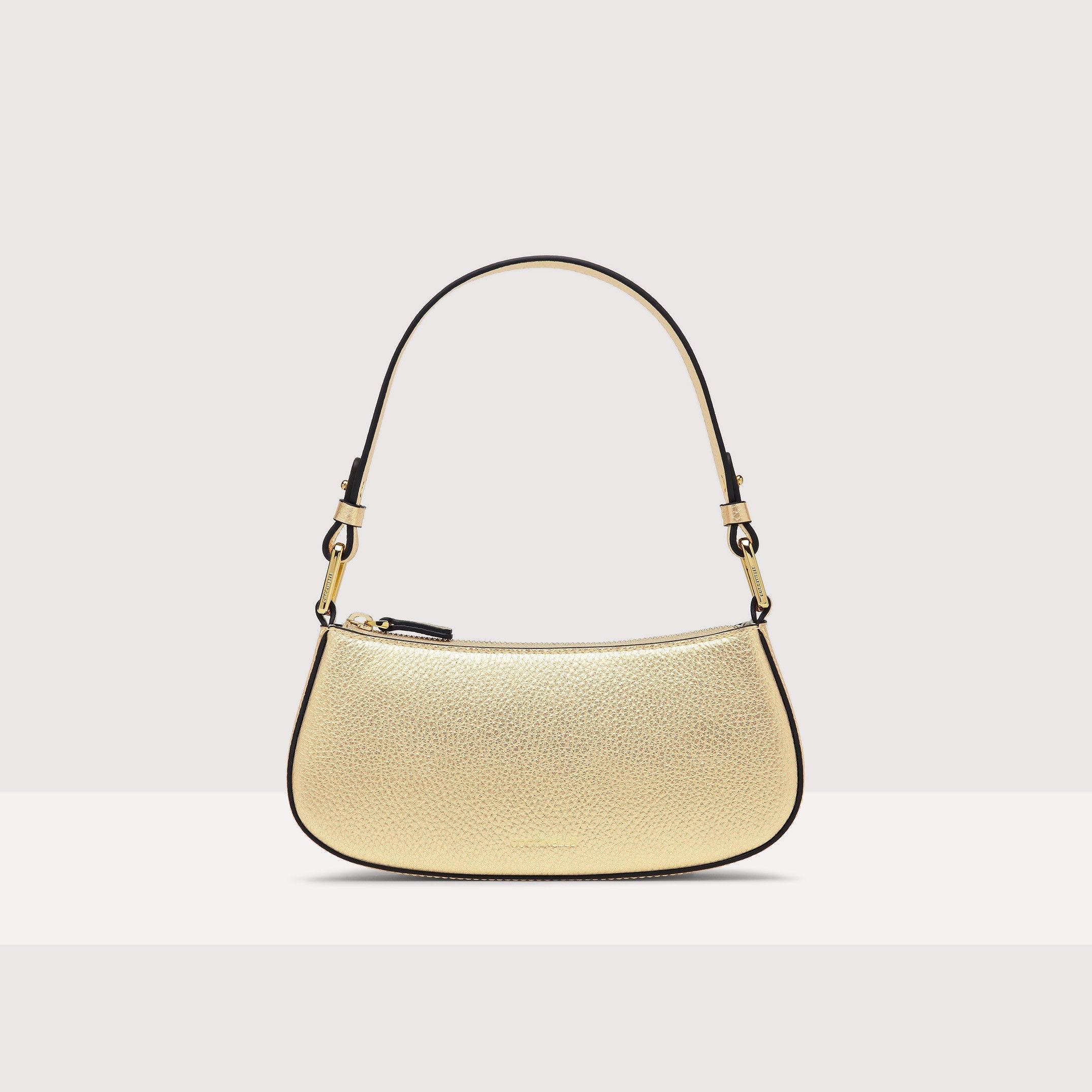 Coach legacy jacquard chelsea crossbody top